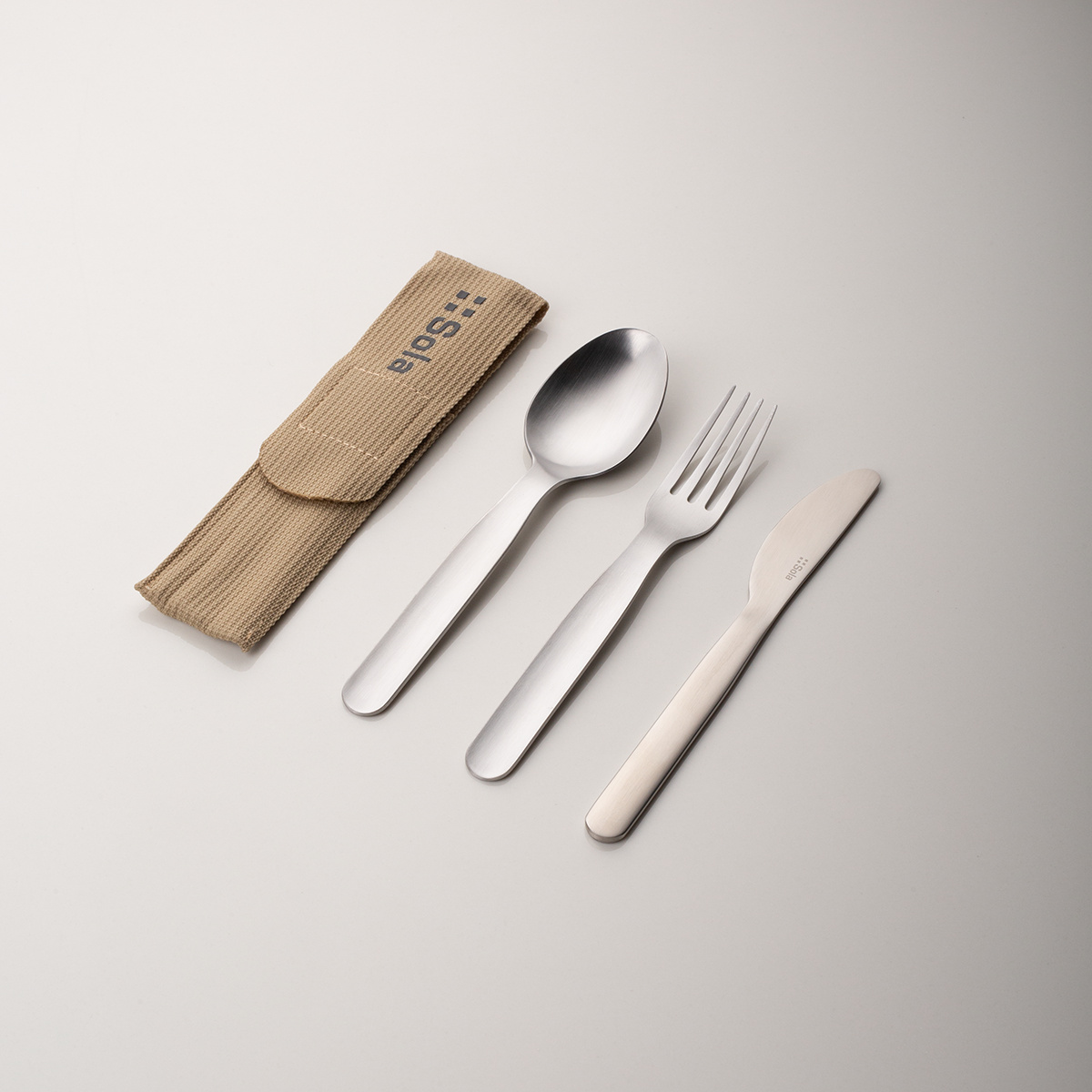 Besteckset 3-tlg. in Bag beige mit SOLA-Logo